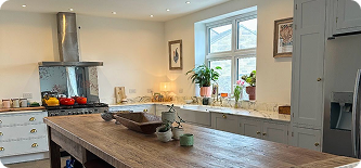 clean kitchen with dinner table